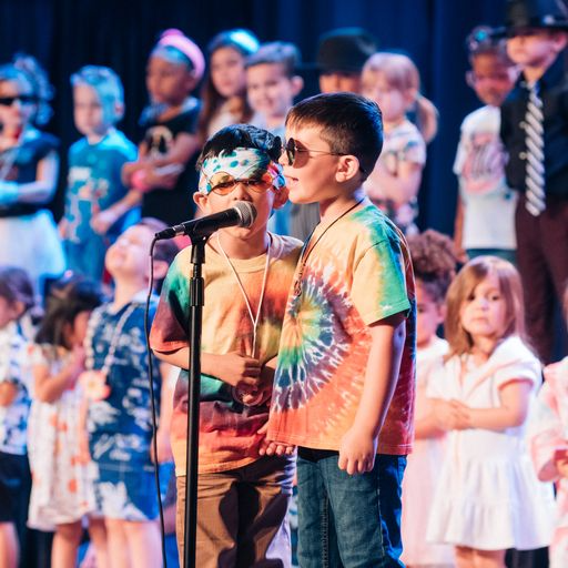 group of preschool students hugging